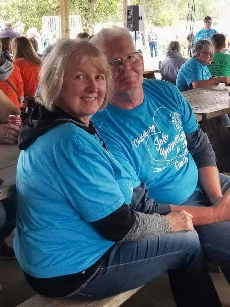 Chaseburg Area Cancer Walk participants seated at a picnic table